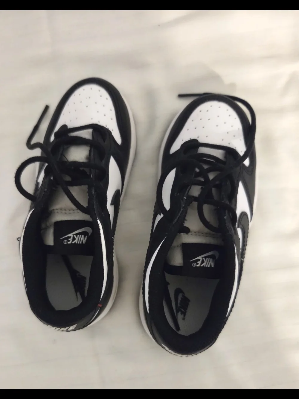 Nike Kids Black and White Low-Top Sneakers with Swoosh